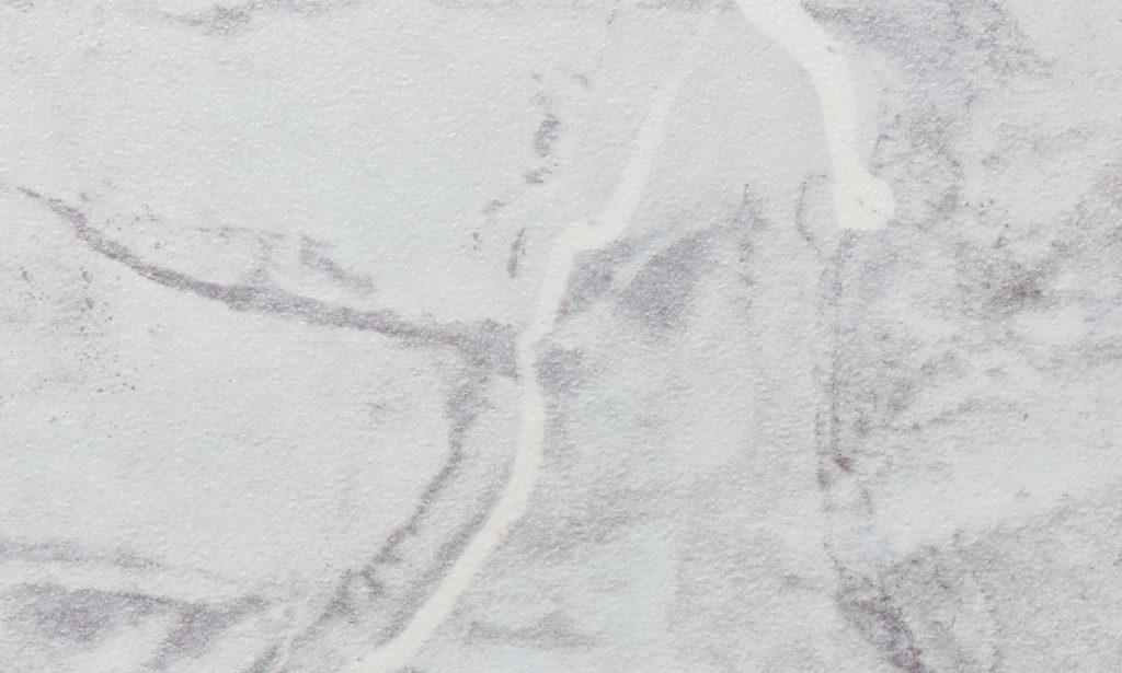 texture of light gray marble with white lines of a pattern macro background ivory color stone