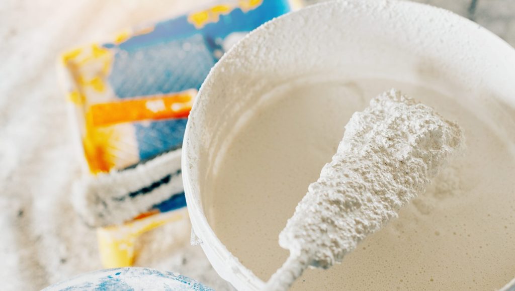 buckets of paint and lime for whitewashing